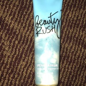 Beauty Rush punchadelic body twirl shimmer lotion.